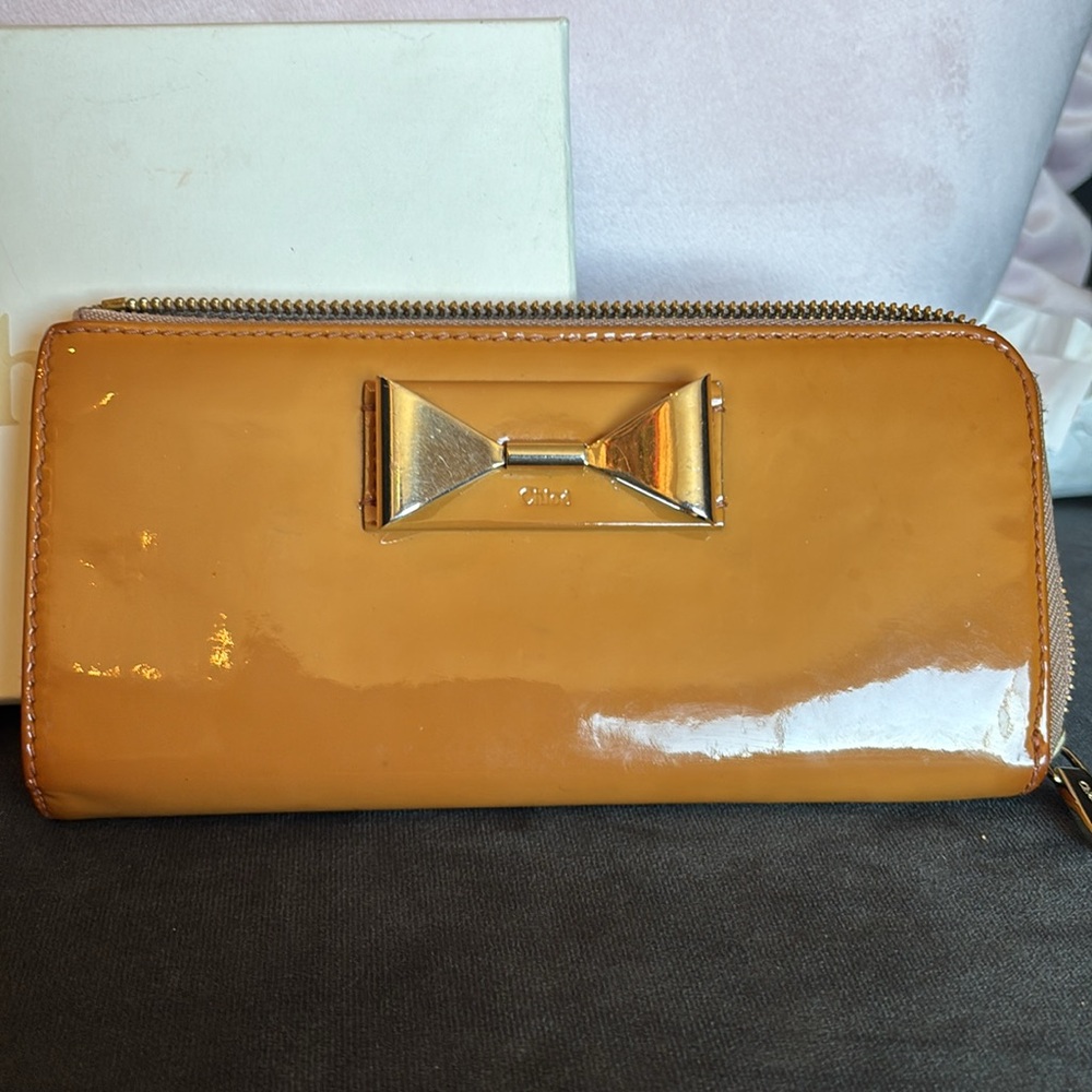 Beautiful patent leather Chloe bow zipper wallet